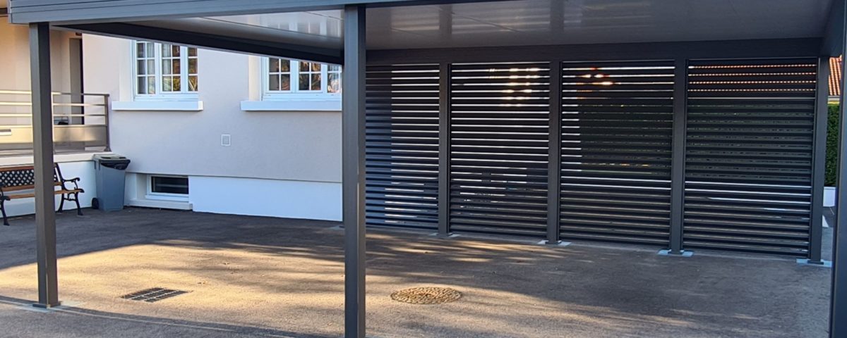 Un carport pour voiture installé à Têche (38) par Arnaud et Blanc.